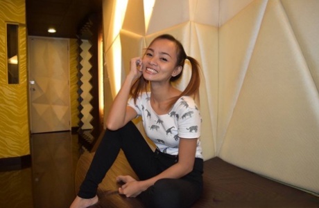 Filipina teen fucks a sex tourist with her hair in pigtails 31210979