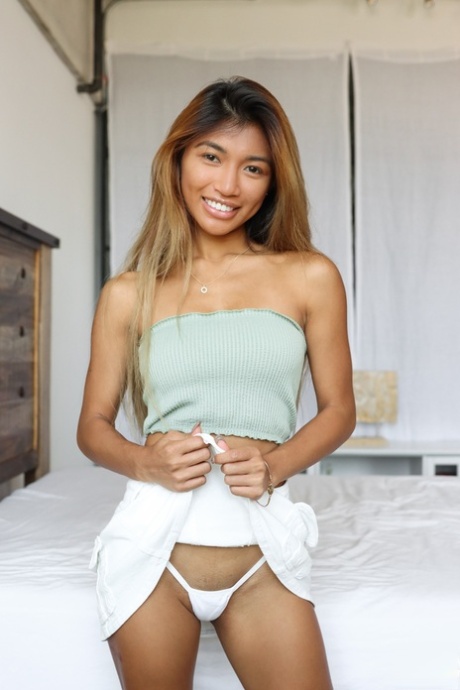 Skinny Asian teen Clara Trinity has POV sex with a large cock on a bed 44475794