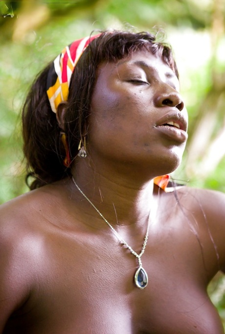 Older black woman Lewa getting naked in woods for nude modeling debut 34707900