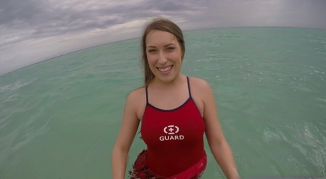 Teen babe Kimber Lee flashing large natural tits in the ocean 94159802